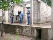 ICDM director Yvan Pierre and five-person work team from Pennsylvania work on the Center of Hope construction